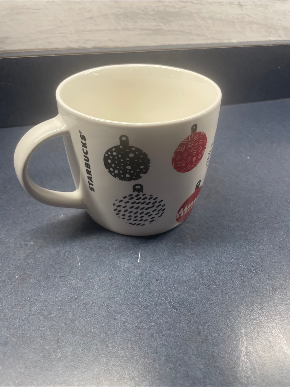 Starbucks White Mug with Red and Black Ornament Motif
